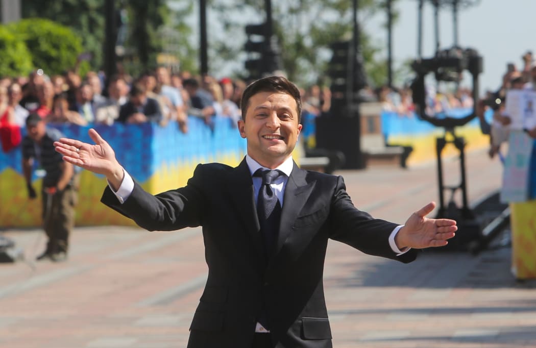 Ukraine's new President Volodymyr Zelensky greets people as he arrives at the parliament for a ceremony of his oath during the inauguration ceremony in Kyiv, Ukraine, May 20, 2019. Newly elected President of Ukraine Volodymyr Zelensky sworn in as Ukraine's president.
