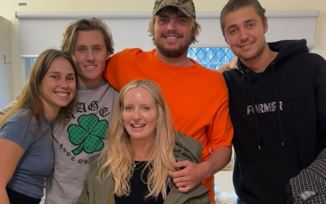 An Instagram post shared by Kai McKenzie (second from left) with friends as he recovers after a shark attack.