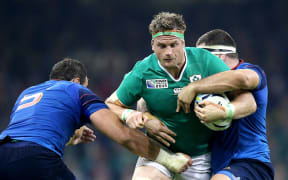 Ireland's Jamie Heaslip is tackled by French players at Millennium Stadium in their 2015 Rugby World Cup Group D decider, Cardiff, Wales 11/10/2015. Mandatory Credit ©INPHO/Dan Sheridan
