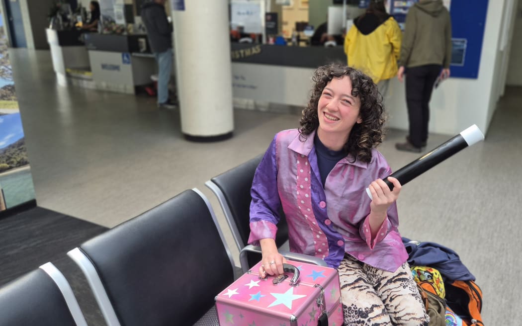Ferry entertainer Siofra Martin waiting to board the Interislander at terminal in Wellington.