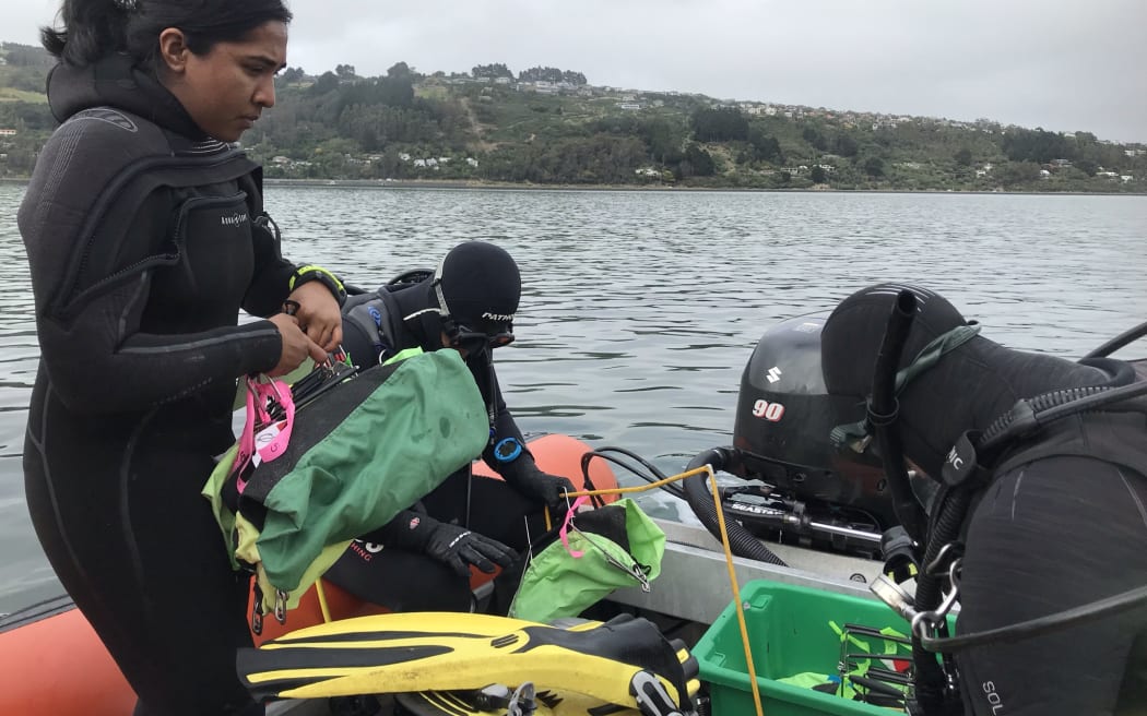 Namrata Chand prepares the equipment for Joe and Will to collect seaweed.