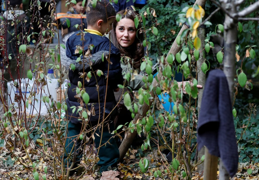 The duchess helped children search for spiders and other "mini beasts".