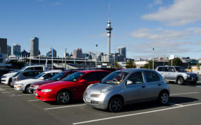 Carparks in Auckland, with the Sky Tower in the background.