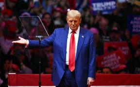 Former US President and Republican presidential candidate Donald Trump gestures after speaking at a campaign rally at Madison Square Garden in New York, October 27, 2024. (Photo by ANGELA WEISS / AFP)