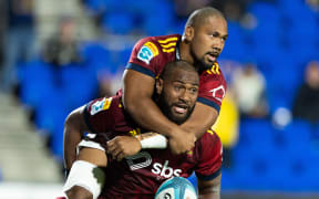 Highlanders winger Mosese Dawai celebrates his try with Folau Fakatava in the Moana Pasiﬁka v Highlanders game at Mt Smart Stadium, Auckland on 31 March, 2023.
