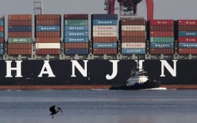 A Hanjin container ship docks at Long Beach, California, after a week stranded at sea for fear it could be seized by creditors.