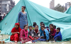 Tent cities are springing up in Nepal, as hospitals struggle to cope.