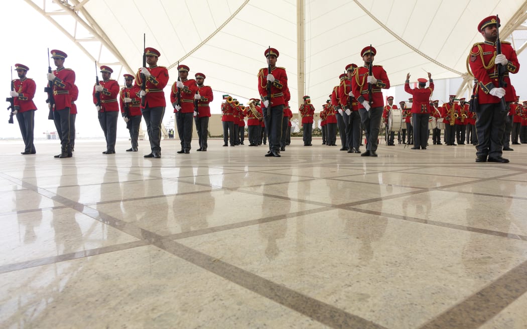 Guards mark Prime Minister John Key's arrival in Kuwait.