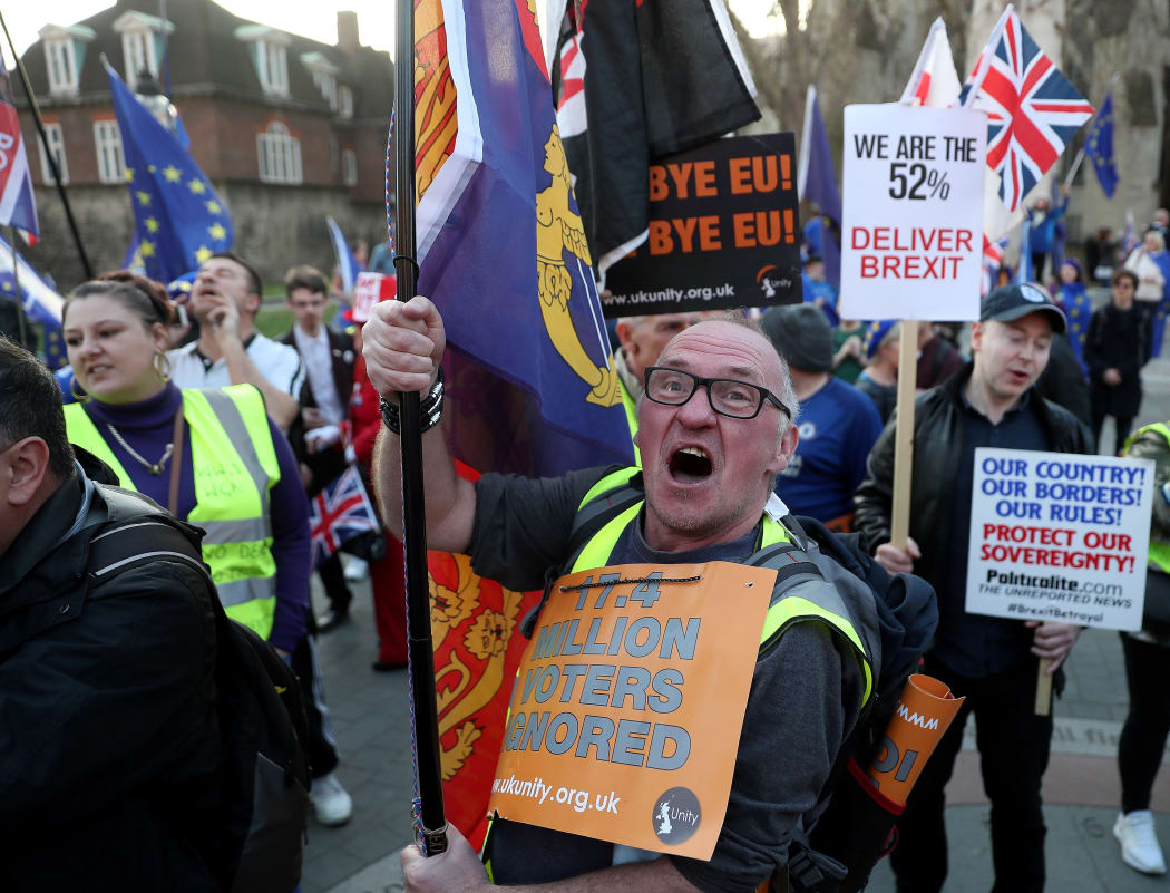 Pro-Brexit activists demonstrate outside the Houses of Parliament in central London on February 27.