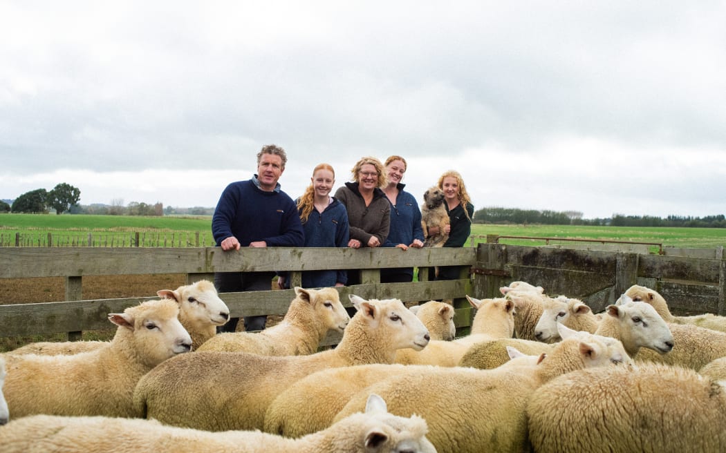 The Strahan family on their sheep and beef farm at Kiwitea with their border terrier Bear.