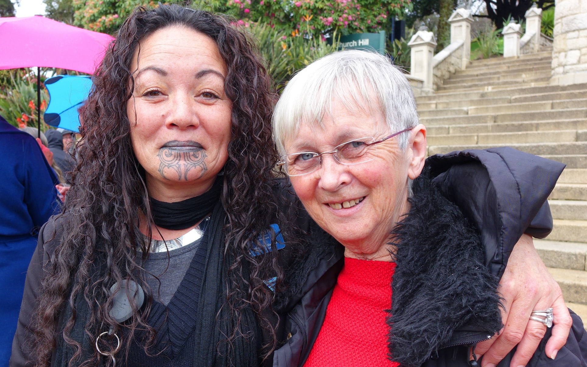 Cindy Batt (Left) and Jan Noonan getting ready to walk in the Suffrage Day march in Nelson today.
