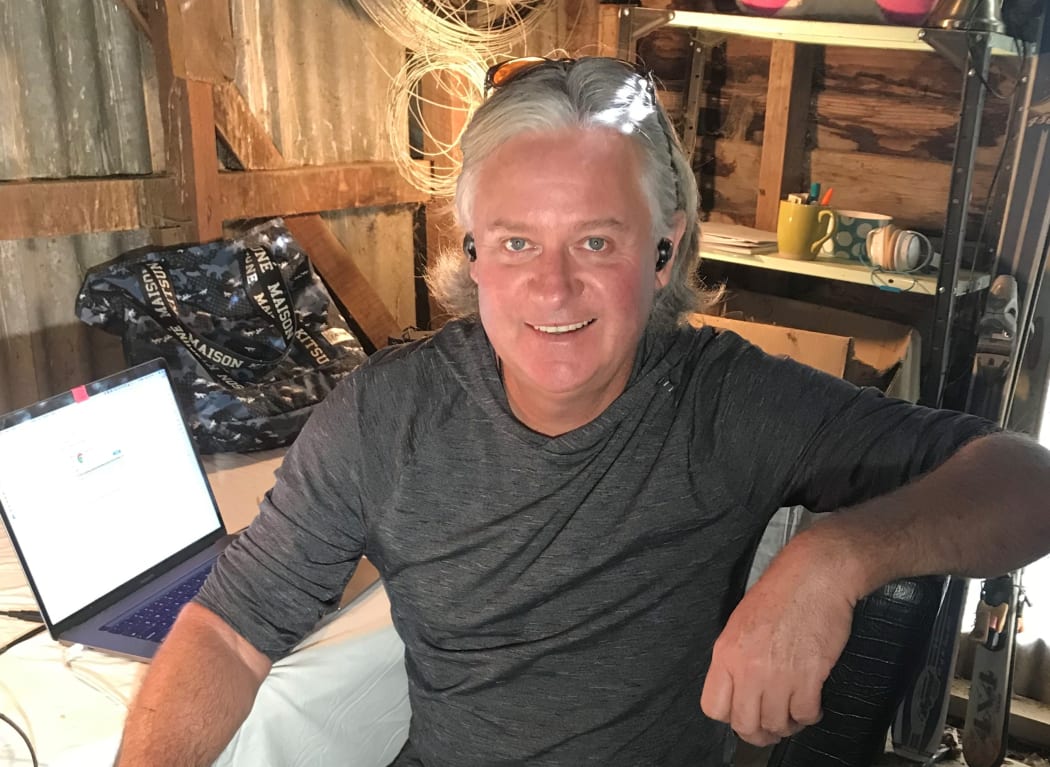 Philip Smith in the chicken shed turned office on the farm in Queenstown