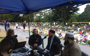 Susie Ferguson, Mohamed Hassan, Omar Suleiman and Qasim Rashid Ahmad discuss issues around the Christchurch mosque attacks, from the RNZ special broadcast outside the Botanic Gardens.