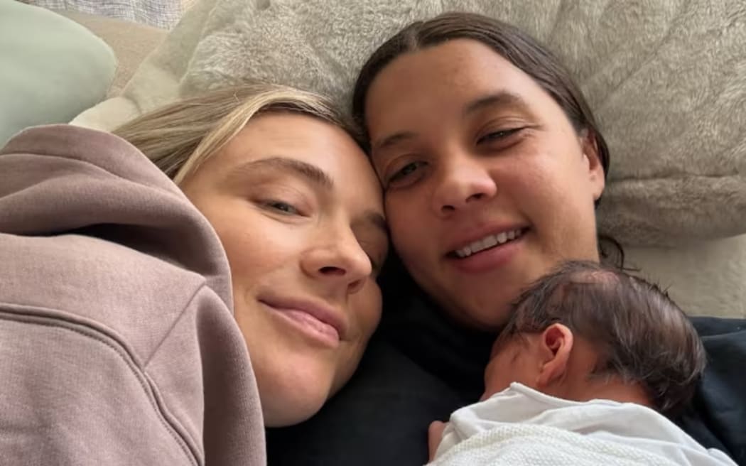 Kristie Mewis and Sam Kerr