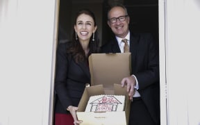 Jacinda Ardern and Phil Twyford at the first state house erected in 1937 by Labour.