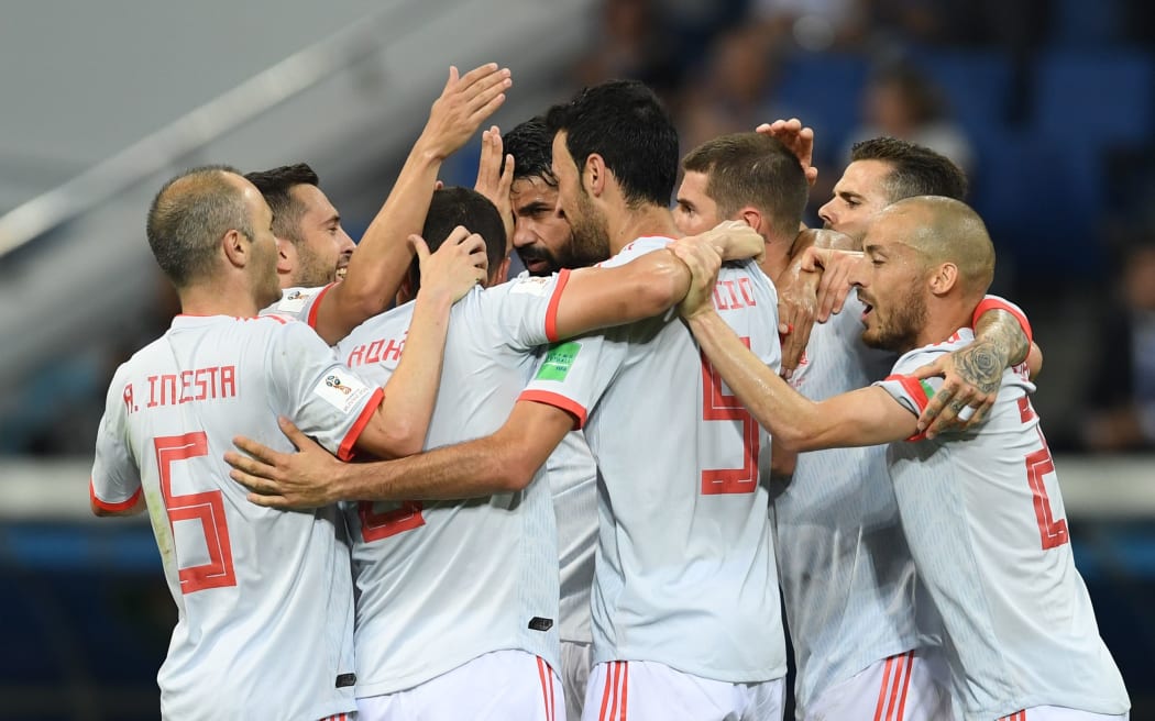 Spanish players celebrate a Diego Costa goal.