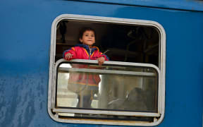 A child refugee heading into Austria from Hungary.
