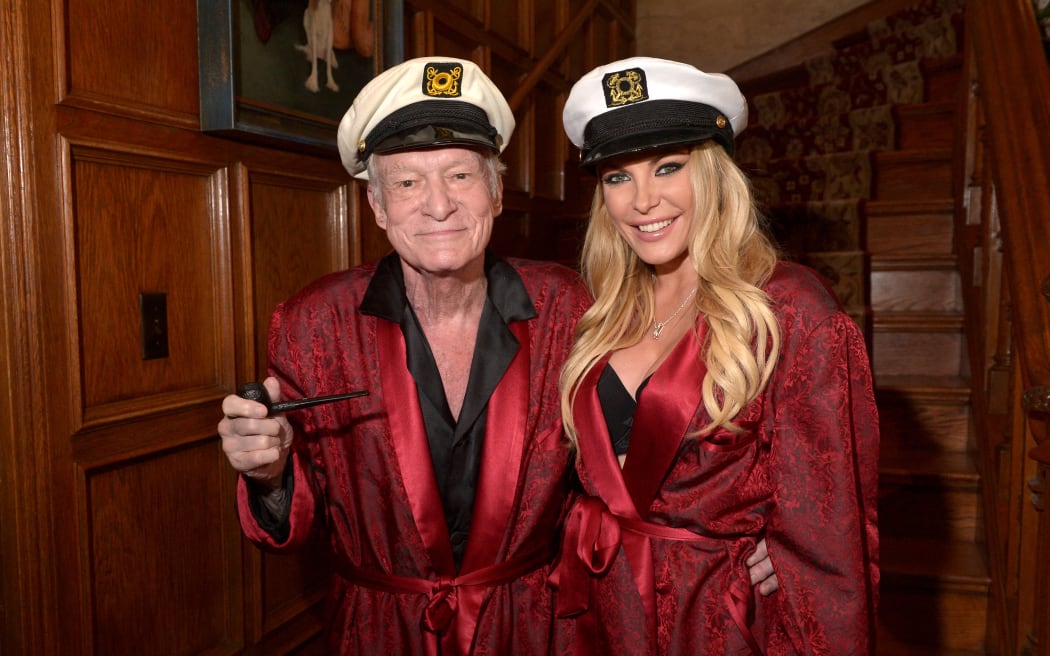 Los Angeles, CA - OCTOBER 25: Hugh Hefner and Crystal Hefner attend Playboy Mansion's Annual Halloween Bash at The Playboy Mansion on October 25, 2014 in Los Angeles, California.   Charley Gallay/Getty Images for Playboy/AFP (Photo by Charley Gallay / GETTY IMAGES NORTH AMERICA / Getty Images via AFP)