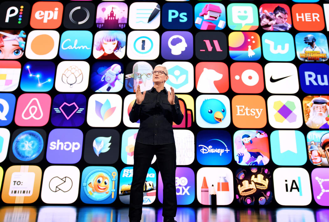 This handout image obtained June 7, 2021 courtesy of Apple Inc. shows Apple CEO Tim Cook spotlights the dynamic community of App Store developers across the globe at Apple's Worldwide Developers Conference at Apple Park in Cupertino, California. -