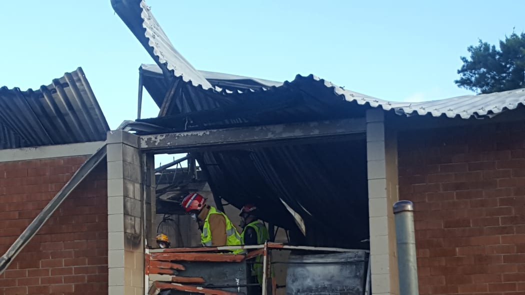 Firefighters work at Long Bay College