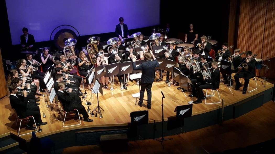 Mike Ford wears many hats including that of manager of the national youth brass band of New Zealand.