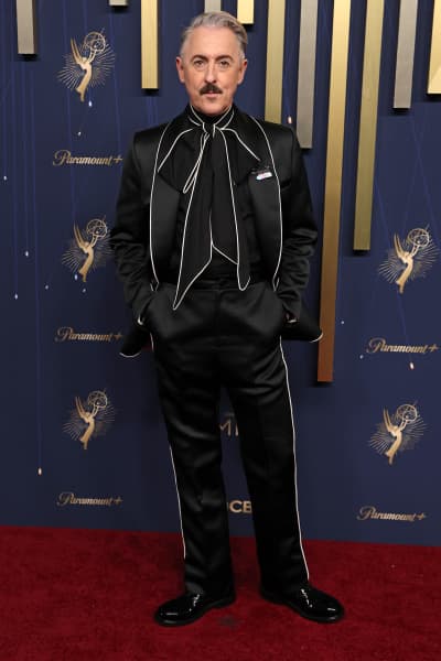 British actor and director Alan Cumming arrives for the 77th Primetime Emmy Awards at the Peacock Theatre at LA Live in Los Angeles on September 14, 2025. (Photo by Patrick T. Fallon / AFP) / RESTRICTED TO EDITORIAL USE
