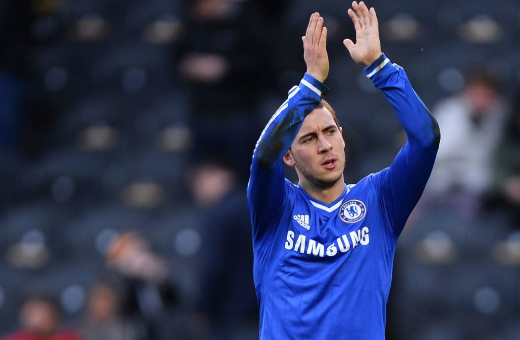 Chelsea winger Eden Hazard applauds the fans.