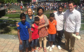 The Amarasinghe family have the support of the town and local MP Hamish Walker (right).