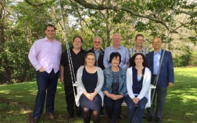 Lucy Schwaner, front row right, posed for a Vision and Voice picture with David Collings, back row second left, before quitting when he beat her to become Howick Local Board chair.