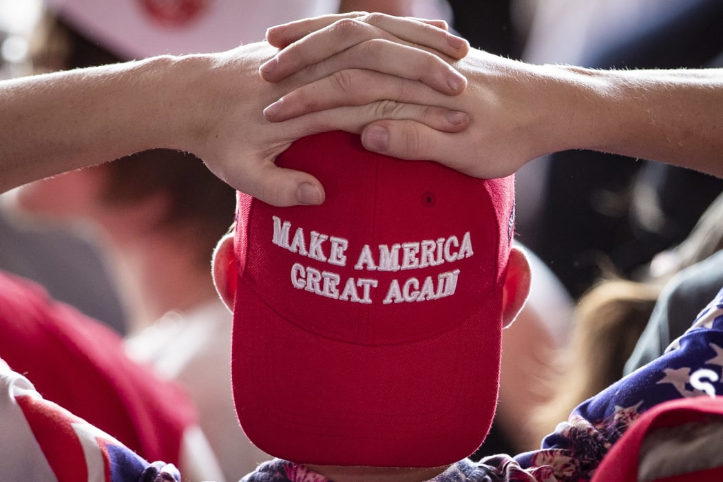 MONTOURSVILLE, PA - MAY 20: A man wears a 'Make America Great Again' hat as he waits for U.S. President Donald Trump to arrive for a 'Make America Great Again' campaign rally at Williamsport Regional Airport, May 20.