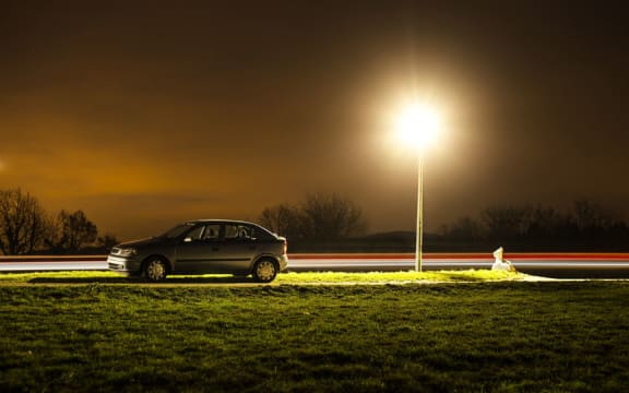 Car parked in the dark