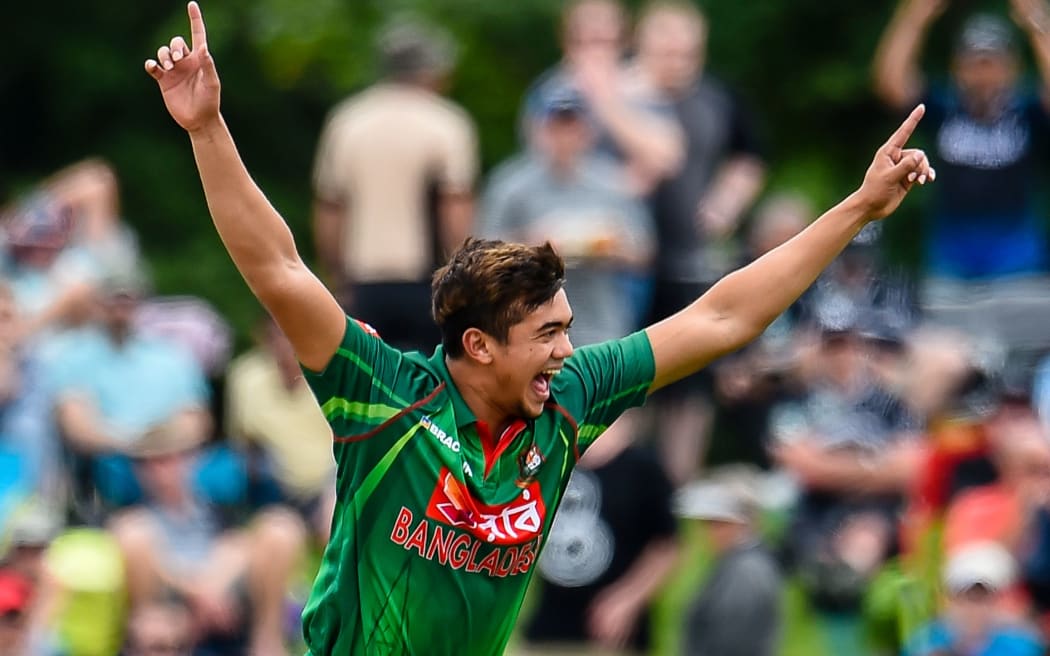 Taskin Ahmed celebrates taking the wicket of Kane Williamson