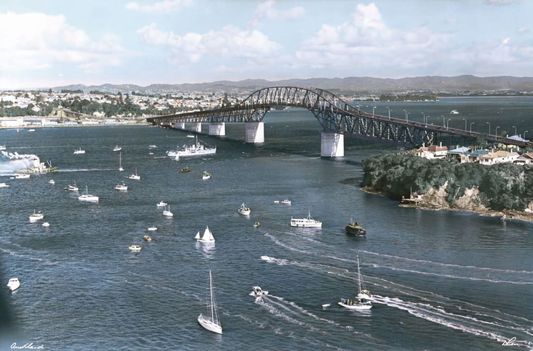 A flotilla of boats gather to celebrate the opening of the then four-lane Auckland Harbour Bridge in 1959.