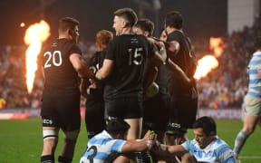 The All Blacks celebrate after Beauden Barrett's try during the Rugby Championship game against Argentina at FMG Waikato Stadium in Hamilton.