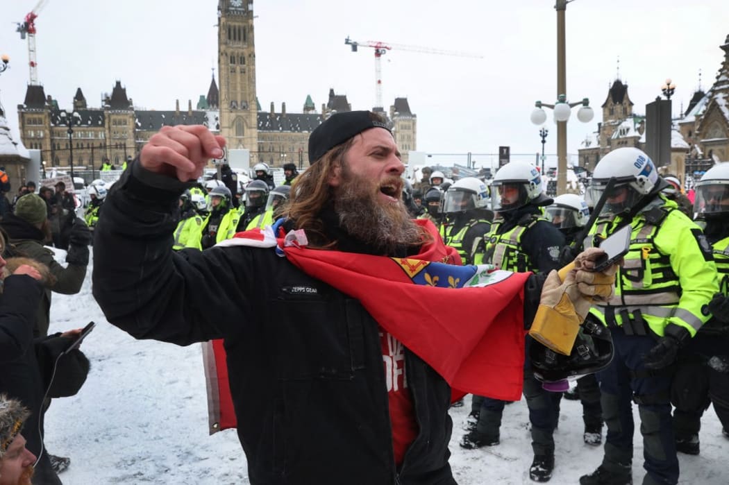 Police and protesters face off in Ottawa.