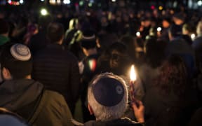 Members and supporters of the Jewish community come together for a candlelight vigil, in remembrance of those who died earlier in the day during a shooting at the Tree of Life Synagogue in the Squirrel Hill neighborhood of Pittsburgh,
