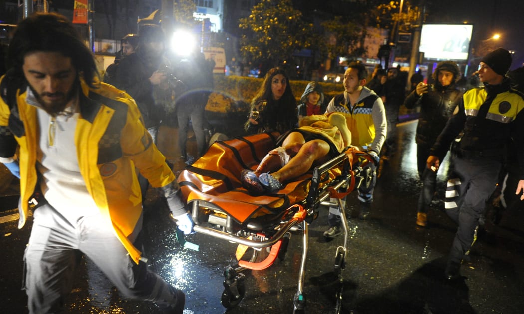 At least 39 people, including 16 foreigners, were killed in the New Year's Eve gun attack, the Turkish interior minister has said.