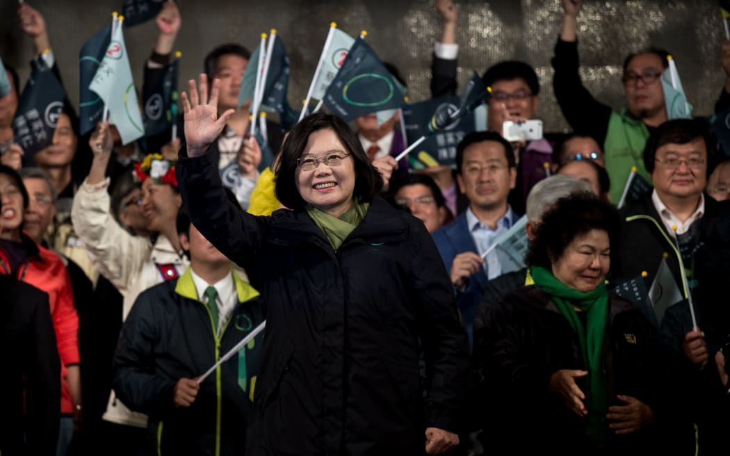 Democratic Progressive Party presidential candidate Tsai Ing-wen celebrates her victory in Taipei.