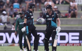 Mitchell Santner and James Neesham during their key partnership in the T20 international against Bangladesh at Bay Oval in Mount Maunganui, Tauranga.