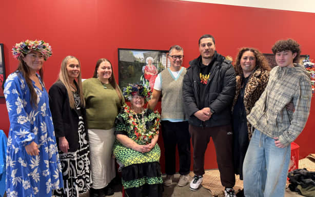 Teremoana O-Maua-Hodges surrounded by family at the exhibitions opening.