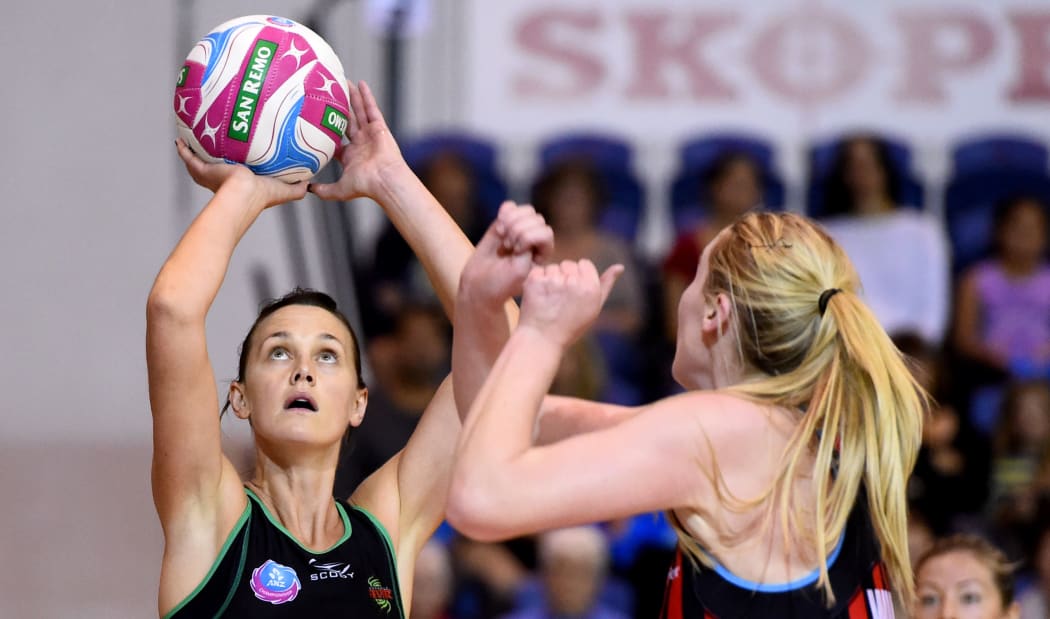 West Coast fever player Natalie Medhurst shoots against the Mainland Tactix.