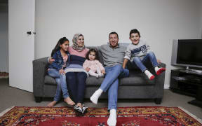 Brighter Futures project. Syrian refugee family.  Lin Youssef (8), Majed Burhan (Mother), Najwa Youssef (2), Ibrahim Youssef (Father), Ahmad Youssef (6)