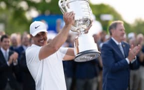 Brooks Koepka with the US PGA Championship trophy, 2023.