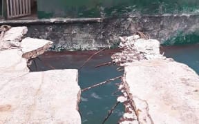 The damaged wharf at Ofu