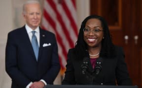 Judge Ketanji Brown Jackson, with President Joe Biden, speaks after she was nominated for Associate Justice of the US Supreme Court, in the Cross Hall of the White House in Washington, DC, February 25, 2022.