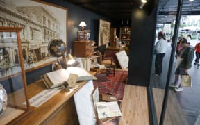 Smith & Caughey's - historical window display showing store's history