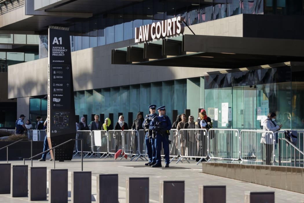 People arriving at the High Court in Christchurch this morning.