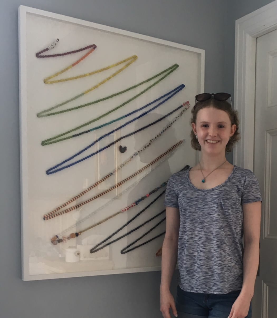 Lara Cooke with her beads of courage
