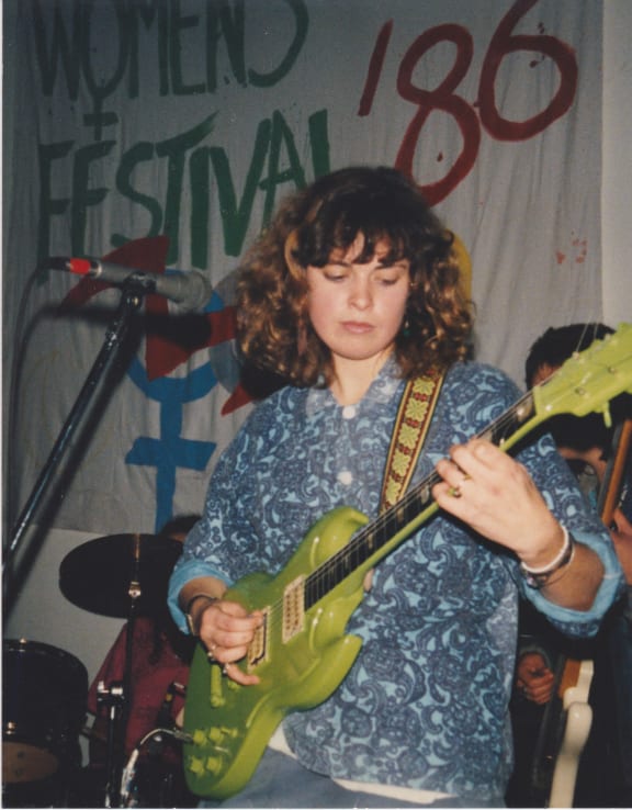 Jan Hellriegel performing at a Women's Festival in1986.