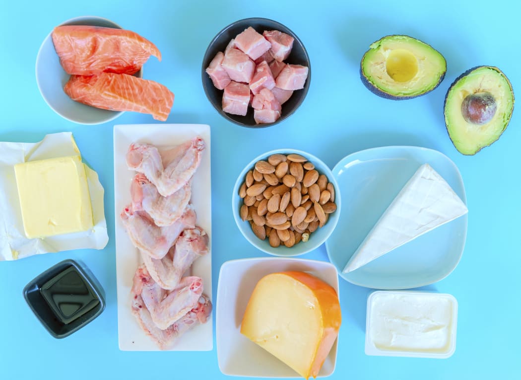 Ketogenic food. Low-carb food including, fish, meat, cheese, nuts, oil and butter. (Photo by WLADIMIR BULGAR/SCIENCE PHOTO LI / WBU / Science Photo Library via AFP)